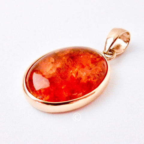 14kt Bezel Set Oval Amber Pendant