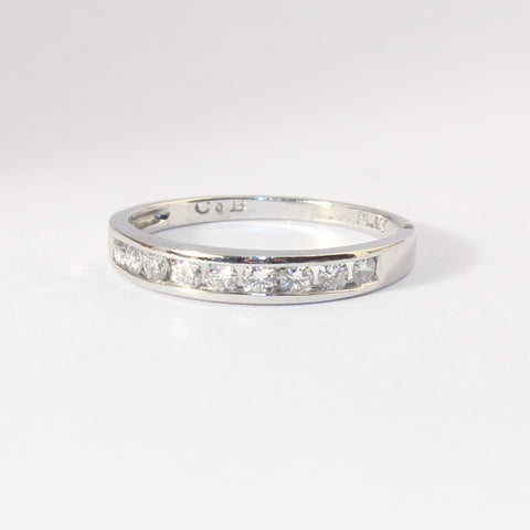Platinum Band with 9 channel set diamonds