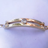 Double bar Bracelet with Bezel Set Diamonds