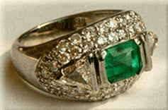 Emerald cut Emerald with Trillion Diamonds