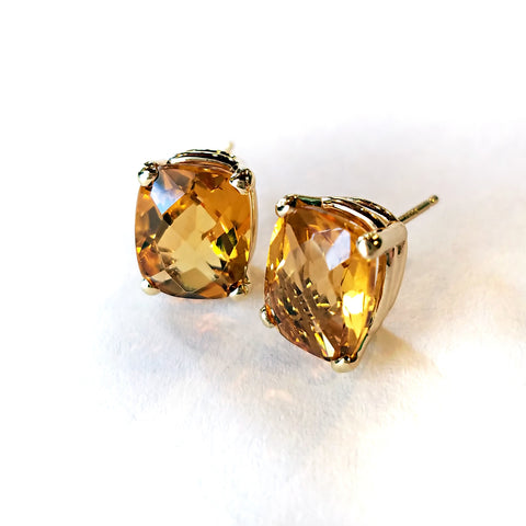 Cushion cut citrine sparkles like sunshine set in gold stud earrings for a special custom deisgn.