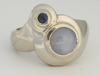 Gray Star Sapphire in an art deco style setting