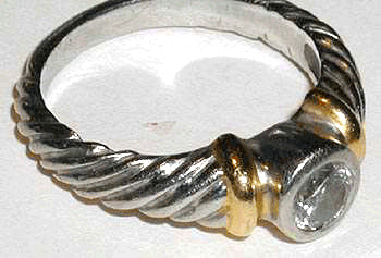 Round Diamond Bezel Set on Twisted Band