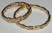 WB-1 — 14 kt Celtic weaving.wedding bands . His and Hers .