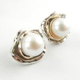 Custom design 14K gold and silver earrings with white pearls and diamonds.