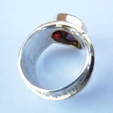 Pear Garnet Set in a Reticulated Silver Band