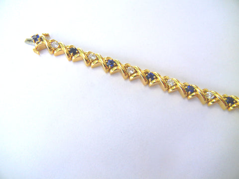 Gold Bracelet with Diamonds and Sapphires