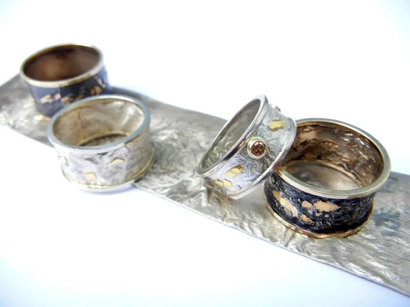 About / stats band — reticulated rings